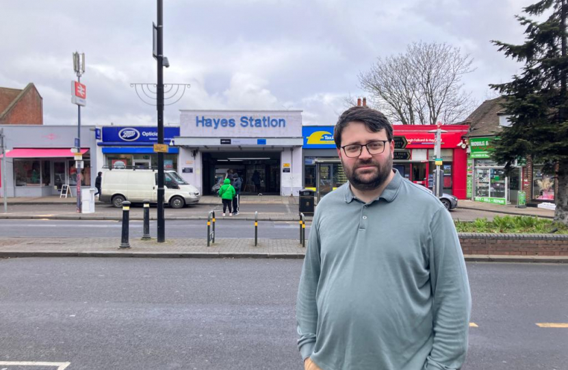 Thomas Turrell AM outside Hayes station